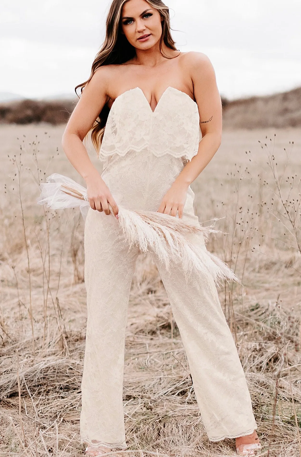 A Classic Feeling Strapless Lace Jumpsuit (Cream)